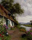 Louis Aston Knight A Riverside Cottage painting